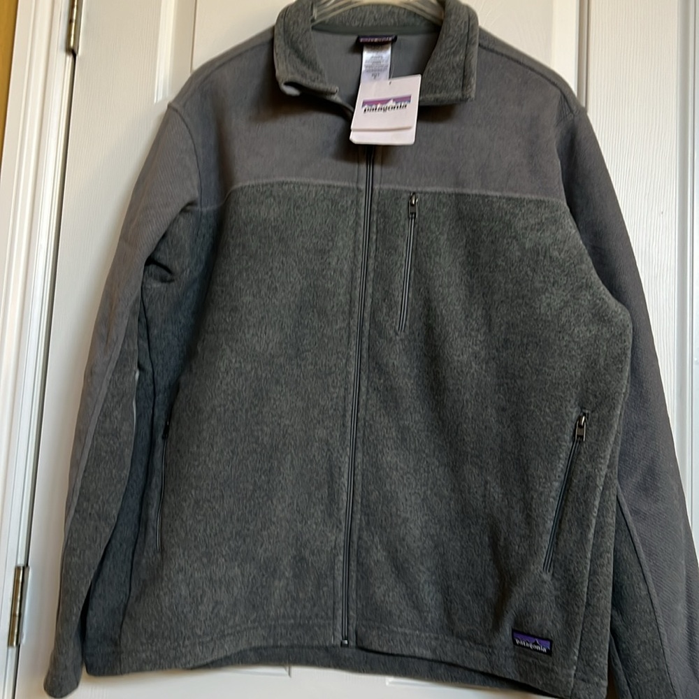 Patagonia mens full ZipUp jacket NWT
   ( company name - Right arm area )